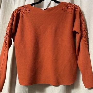 Chic Orange Sweater with Lace and Pearl Accents